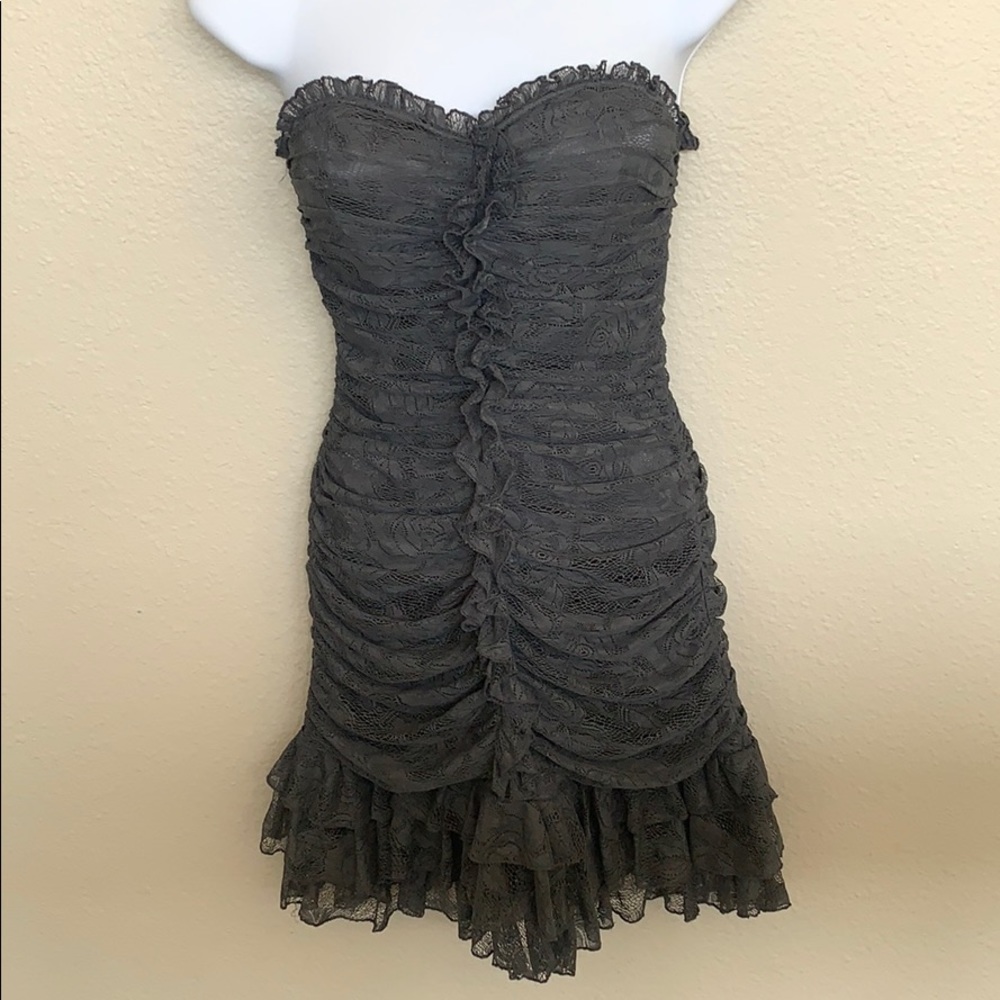Strapless grey lace mini dress.